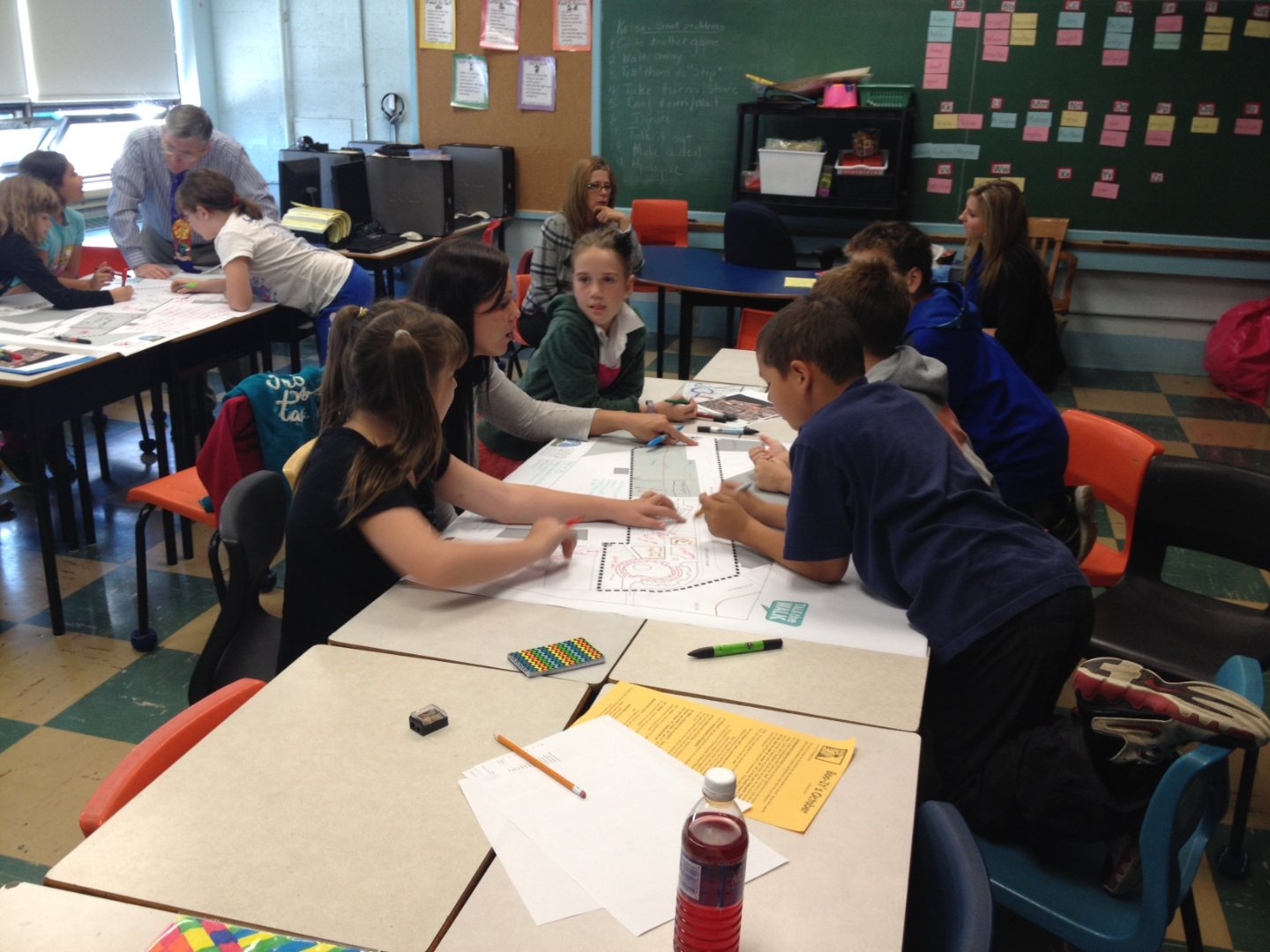 Community engagement workshop with participants around a table