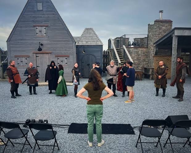 Costumed interpreters performing inside the fort courtyard