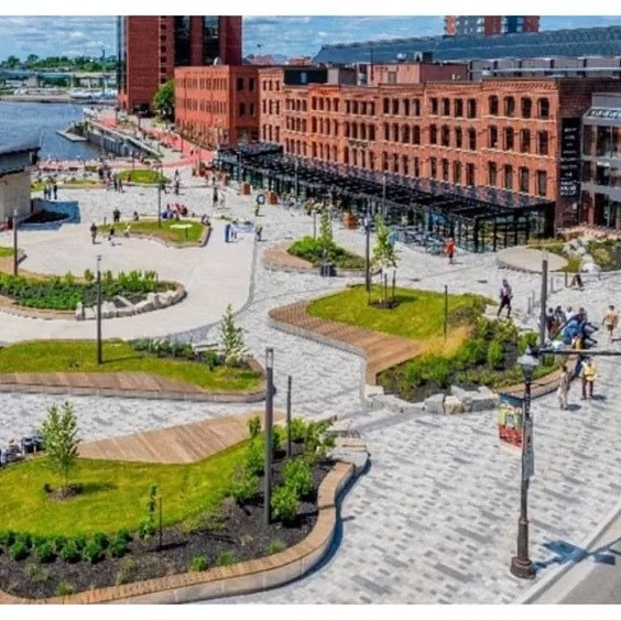 The revitalized Market Slip plaza with curved plantings and paving